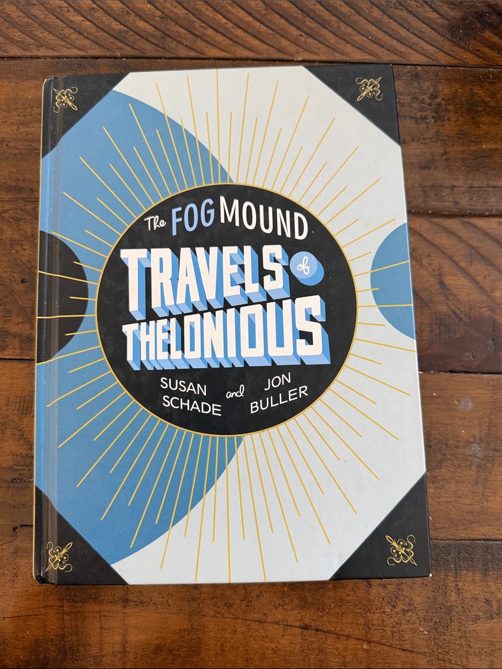The Fog Mound Travels of Thelonious Hardcover Book - Blue, Black, Gold